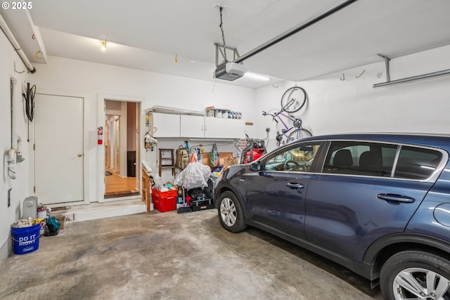 240 NE 5th St, Gresham, OR 97030 - garage featuring a garage door opener