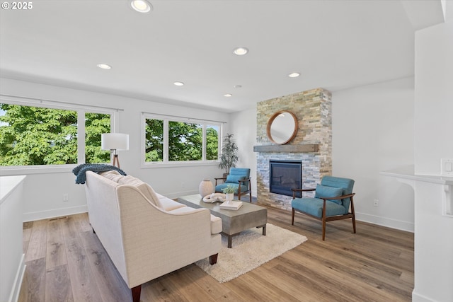 13756 John Jeffrey Ct, Oregon City, OR 97045 - living room with a fireplace, baseboards, light wood-type flooring, and recessed lighting