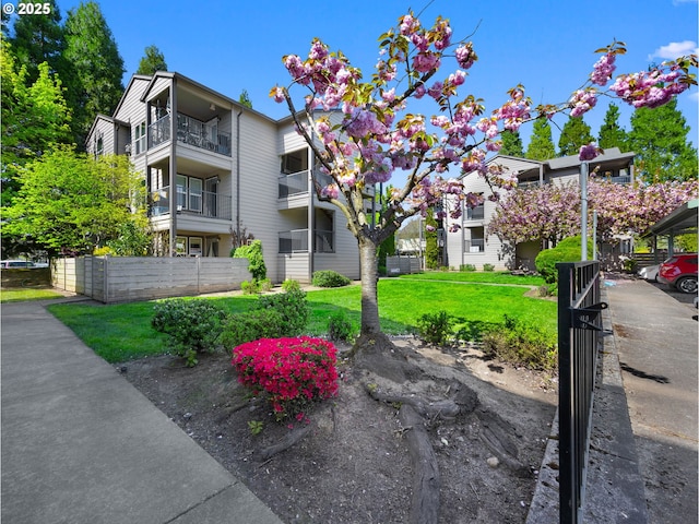 view of property featuring fence