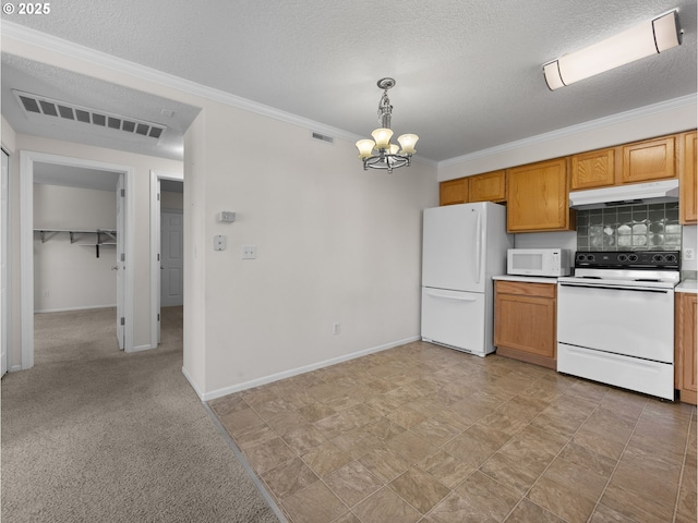 kitchen with visible vents, baseboards, a chandelier, and white appliances