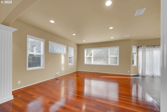 empty room with wood-type flooring