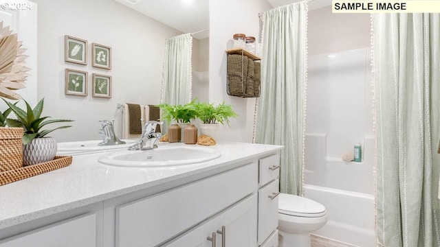 full bathroom featuring vanity, toilet, and shower / bath combo with shower curtain