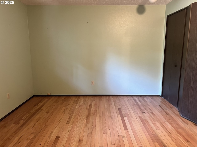 16042 Cornell St, Lake Oswego, OR 97034 - unfurnished bedroom with light wood-style flooring and baseboards