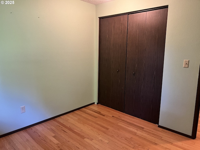 16042 Cornell St, Lake Oswego, OR 97034 - unfurnished bedroom with a closet and light wood-style flooring