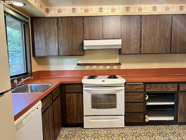 16042 Cornell St, Lake Oswego, OR 97034 - kitchen with white appliances, under cabinet range hood, dark brown cabinets, and dark countertops