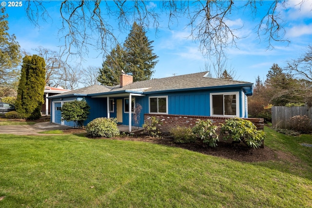 single story home with brick siding, a chimney, an attached garage, fence, and a front yard