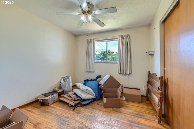 6135 SE Clatsop St, Portland, OR 97206 - bedroom featuring wood-type flooring, ceiling fan, and a closet