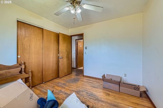 6135 SE Clatsop St, Portland, OR 97206 - bedroom featuring wood finished floors, a closet, and ceiling fan