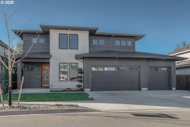 prairie-style home with a garage