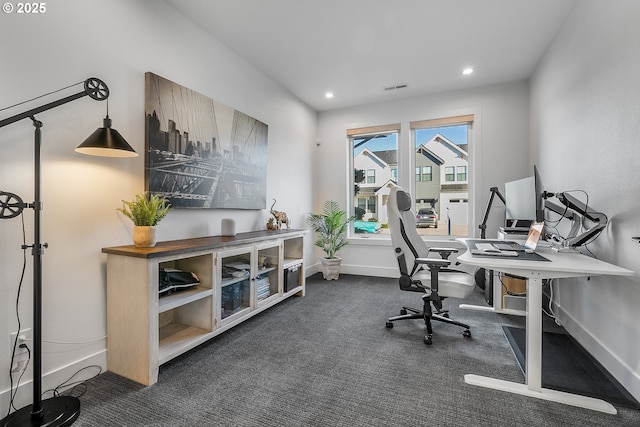 home office featuring dark carpet