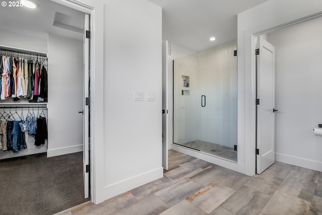 bathroom with an enclosed shower