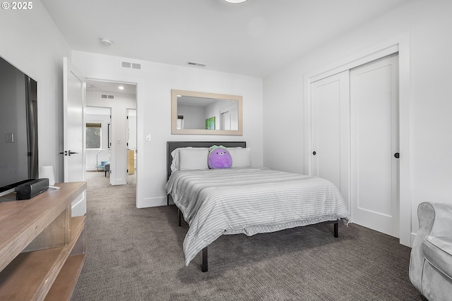 carpeted bedroom with a closet