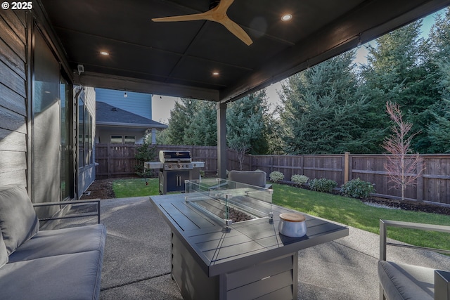 view of patio / terrace with ceiling fan and grilling area