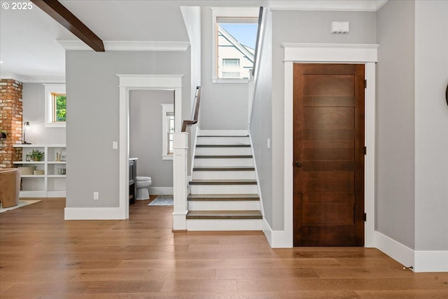 4015 NE 38th Ave, Portland, OR 97212 - foyer entrance with wood finished floors, stairway, and crown molding