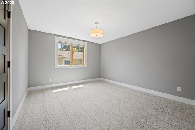 4015 NE 38th Ave, Portland, OR 97212 - spare room featuring baseboards and light carpet