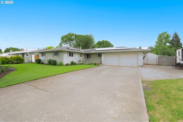 446 44th Ave, Salem, OR 97317 - ranch-style house with a garage, driveway, solar panels, and a gate