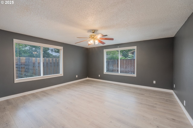 446 44th Ave, Salem, OR 97317 - spare room with ceiling fan, a textured ceiling, plenty of natural light, light wood finished floors, and baseboards