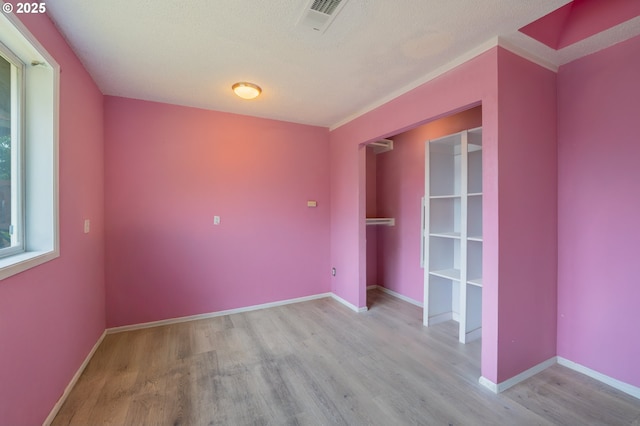 446 44th Ave, Salem, OR 97317 - unfurnished bedroom with wood finished floors and baseboards