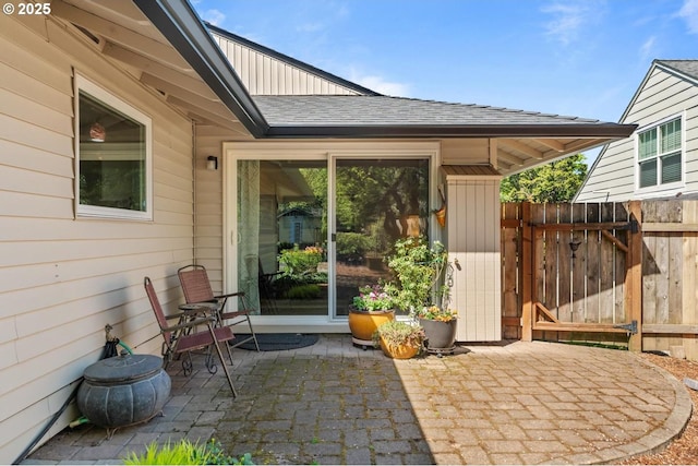 view of patio / terrace with a gate and fence