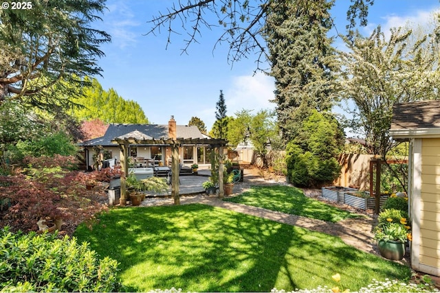 view of yard featuring a patio, a pergola, and a fenced backyard