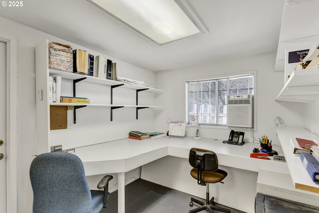 home office featuring built in desk and a wall mounted AC