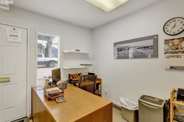 office space featuring baseboards