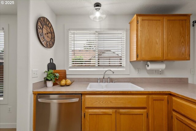 15314 NE 88th St, Vancouver, WA 98682 - kitchen with stainless steel dishwasher and light countertops