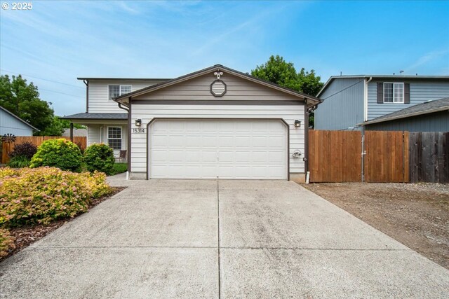 15314 NE 88th St, Vancouver, WA 98682 - traditional-style home with driveway and an attached garage