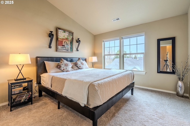 carpeted bedroom featuring lofted ceiling, visible vents, and baseboards