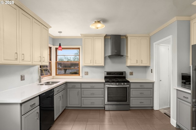 kitchen with sink, stainless steel gas stove, black dishwasher, pendant lighting, and wall chimney range hood