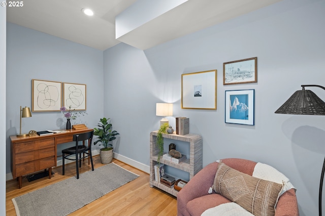 home office featuring wood finished floors, recessed lighting, and baseboards