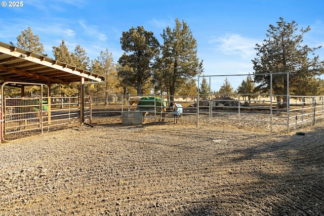 view of yard featuring an outbuilding and an exterior structure