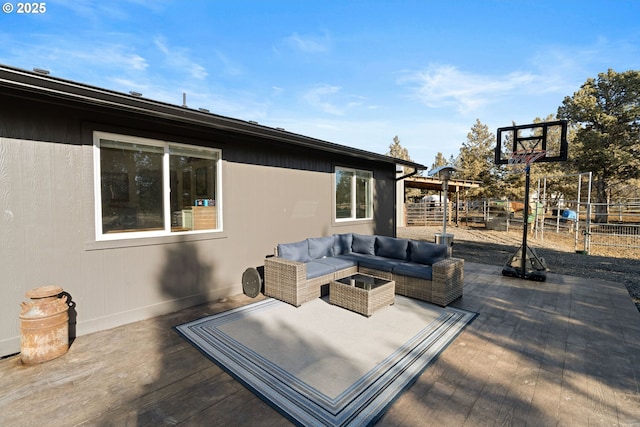 view of patio with fence and an outdoor hangout area