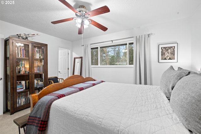 14370 SW Wilson Dr, Beaverton, OR 97008 - bedroom with ceiling fan and light carpet