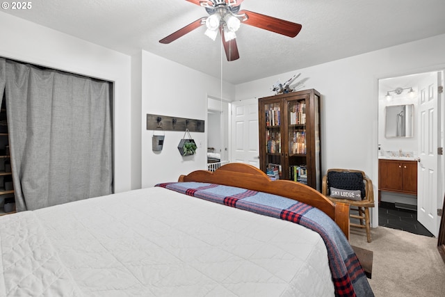14370 SW Wilson Dr, Beaverton, OR 97008 - bedroom with carpet, a sink, a ceiling fan, and a textured ceiling