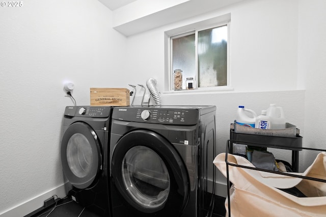 14370 SW Wilson Dr, Beaverton, OR 97008 - laundry area with washer and dryer and baseboards