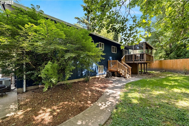 14370 SW Wilson Dr, Beaverton, OR 97008 - view of front of property with stairs, a deck, and central air condition unit