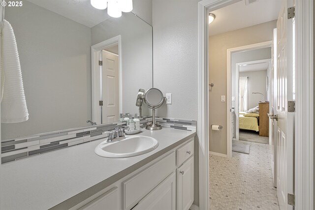 15178 NW Channa Dr, Portland, OR 97229 - ensuite bathroom with vanity and baseboards