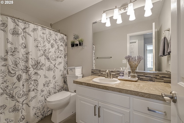 15178 NW Channa Dr, Portland, OR 97229 - full bathroom featuring toilet, tasteful backsplash, and vanity