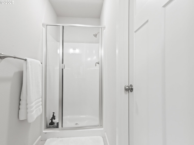 2421 S Trail View Ct, Ridgefield, WA 98642 - full bathroom featuring baseboards and a stall shower