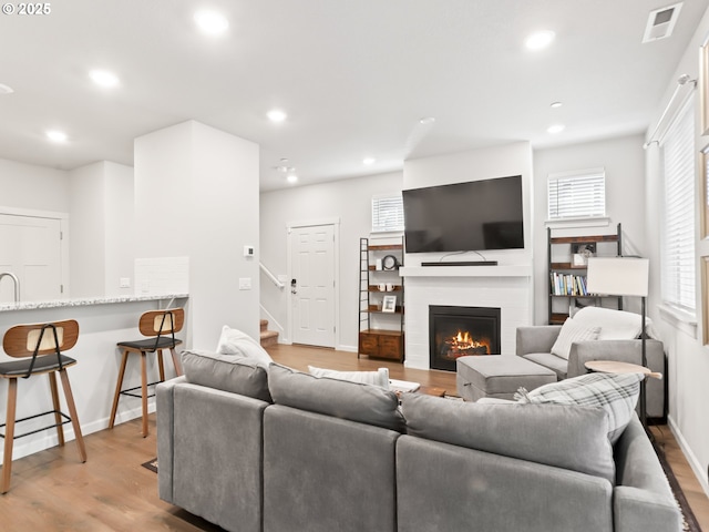 2421 S Trail View Ct, Ridgefield, WA 98642 - living area featuring stairway, recessed lighting, wood finished floors, and visible vents