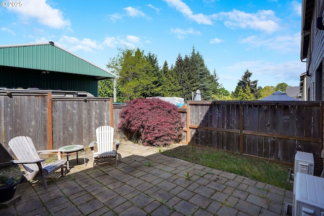 view of patio / terrace featuring a fenced backyard