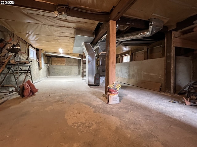 basement featuring heating unit