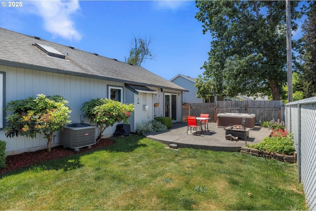33447 SW Sequoia St, Scappoose, OR 97056 - view of yard featuring central AC unit, a patio, and a hot tub