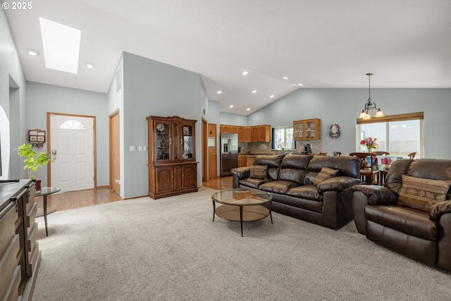33447 SW Sequoia St, Scappoose, OR 97056 - living room with light carpet, recessed lighting, and high vaulted ceiling