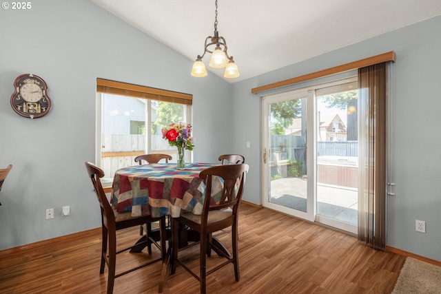 33447 SW Sequoia St, Scappoose, OR 97056 - dining room with healthy amount of natural light, wood finished floors, and lofted ceiling
