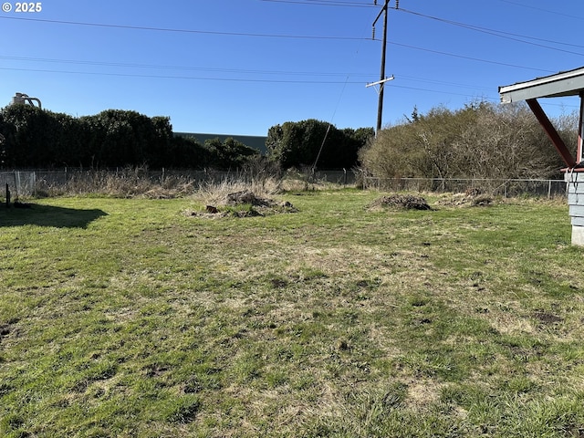 view of yard with fence