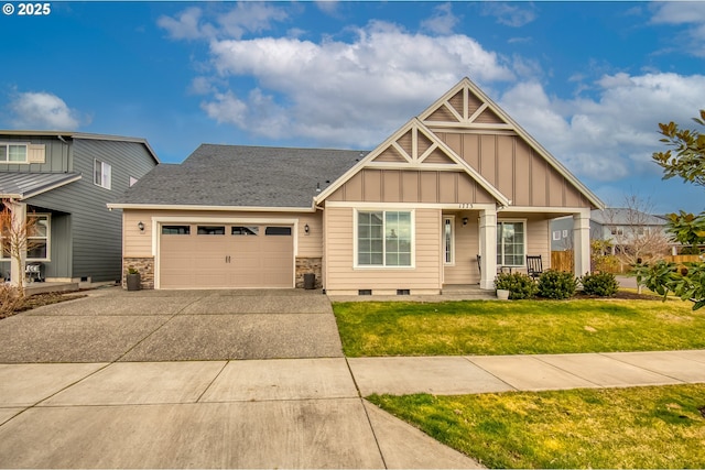 view of front of property with concrete driveway, board and batten siding, crawl space, a garage, and a front lawn