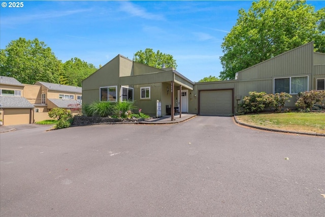 1650 NW Lakeway Ln, Beaverton, OR 97006 - mid-century home with an attached garage and driveway