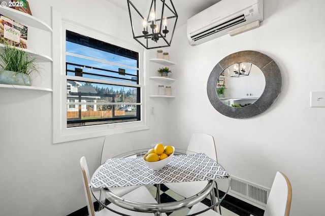 dining area with a wall mounted AC, visible vents, and a notable chandelier